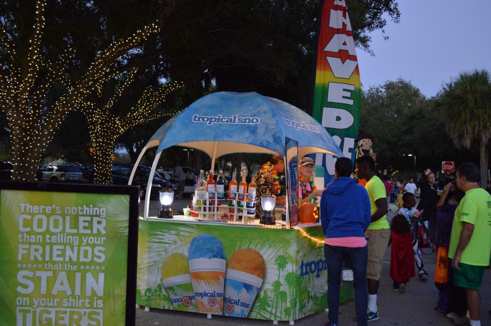 People stand in line for snow cone booth
